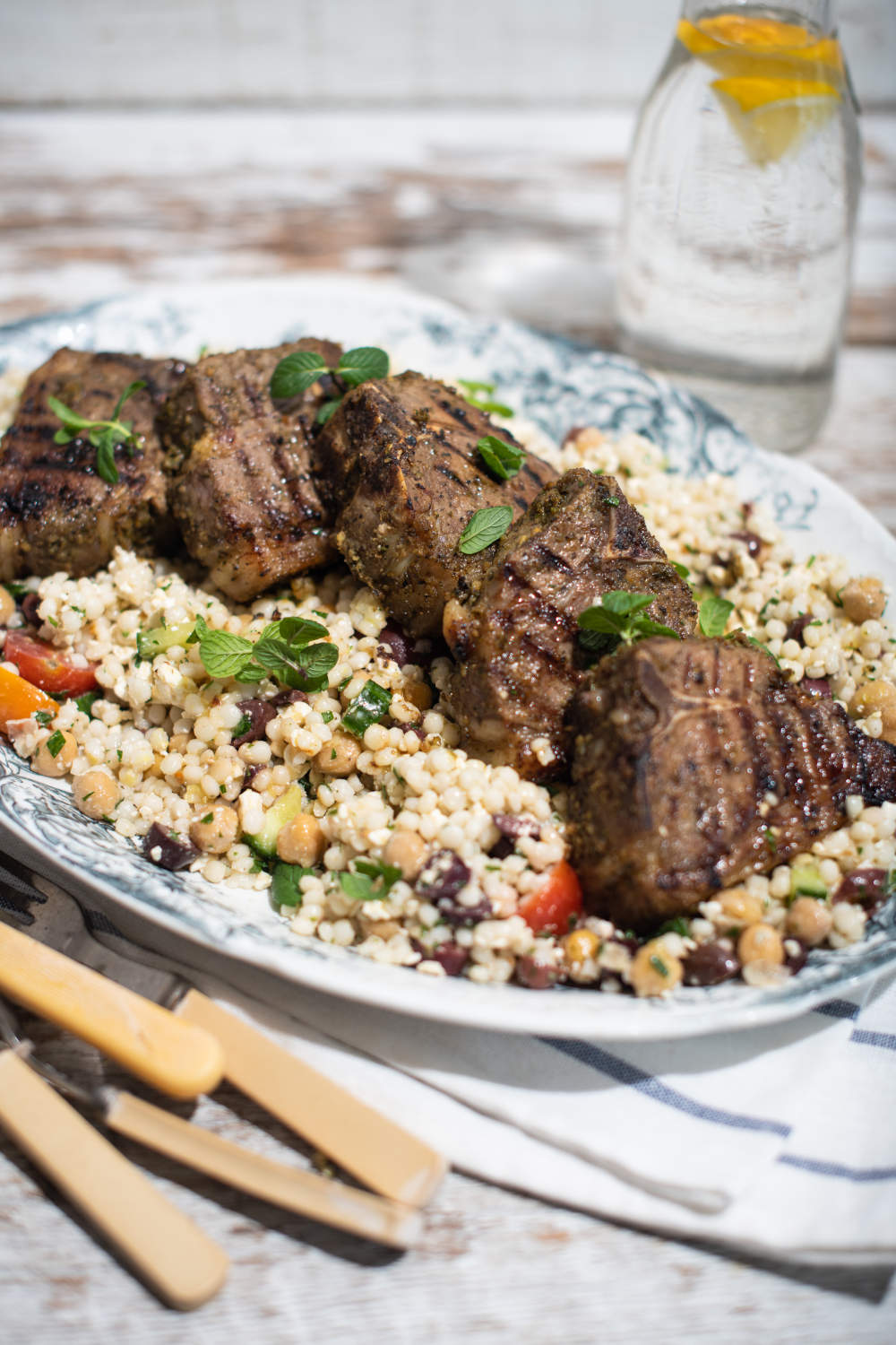 Lamb Chops with Greek Spices and Lemon on Mediterranean Pearl Couscous